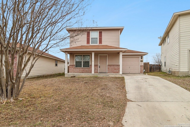 traditional home with an attached garage, covered porch, brick siding, fence, and concrete driveway