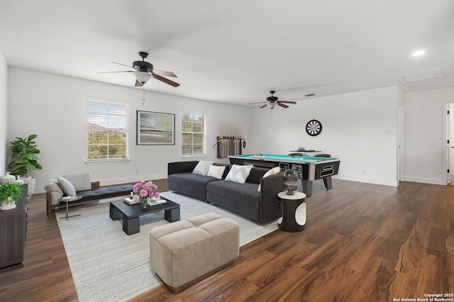 living room featuring dark wood-type flooring, pool table, and ceiling fan