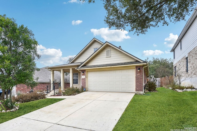 view of front of property with a garage and a front yard