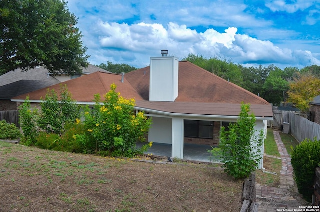 rear view of house with a patio area