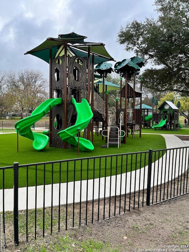 view of play area with a yard