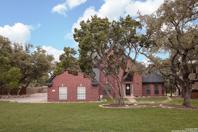 view of front of home with a front yard