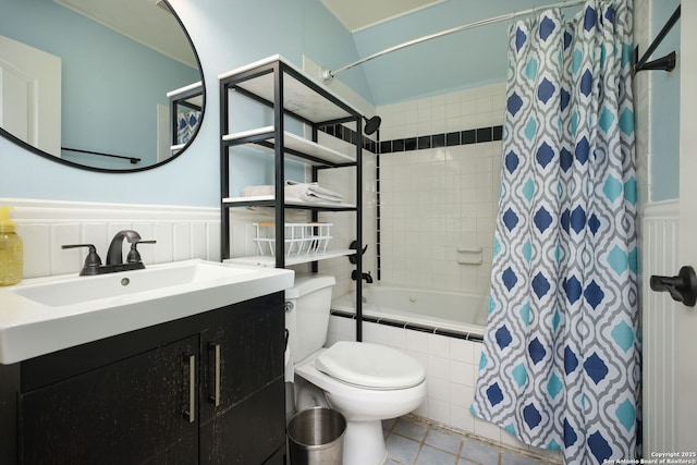 full bathroom with tile patterned flooring, vanity, shower / tub combo with curtain, and toilet