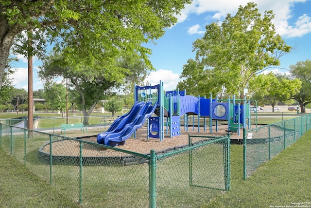 view of jungle gym with a lawn