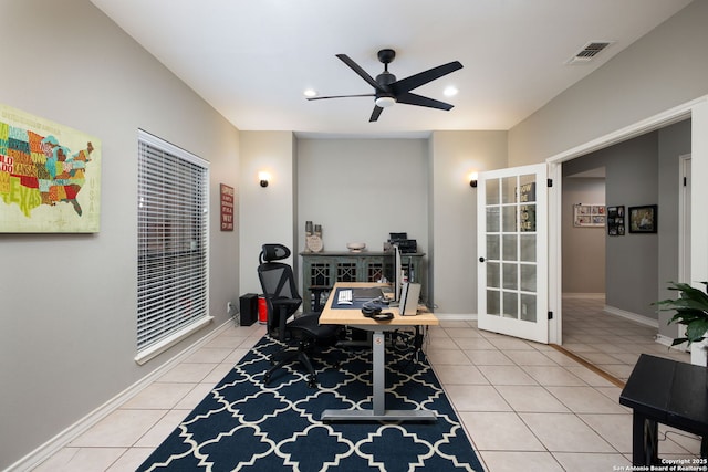 tiled office space with ceiling fan and french doors