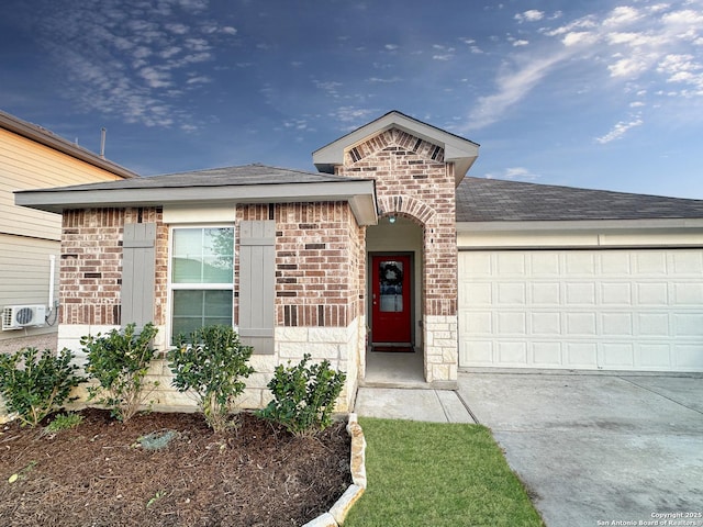 view of front of property with a garage