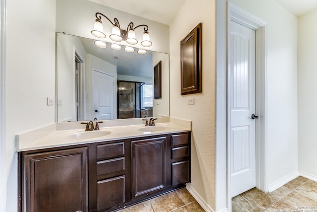 bathroom featuring vanity, tile patterned floors, and a shower with door