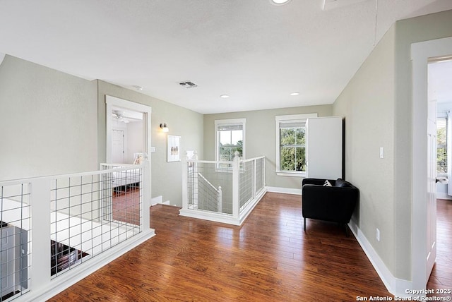 interior space with dark hardwood / wood-style floors