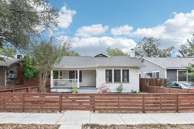 ranch-style house featuring covered porch