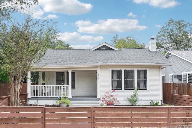 ranch-style house featuring a porch