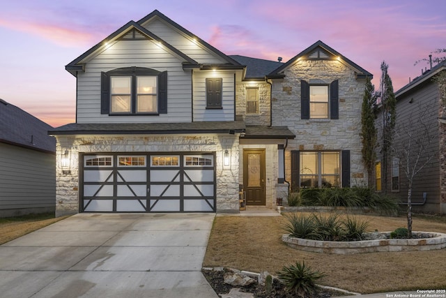 view of front of property featuring a garage