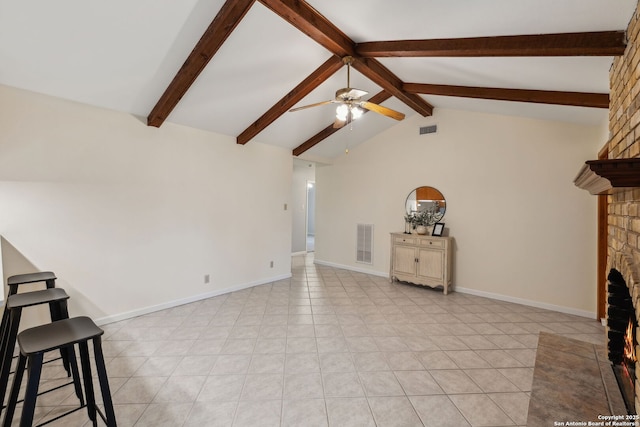 living room with light tile patterned floors, a fireplace, lofted ceiling with beams, and ceiling fan