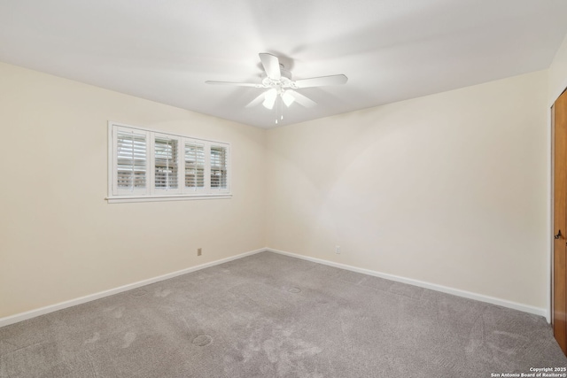 unfurnished room featuring carpet and ceiling fan