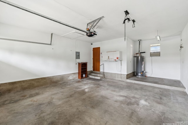 garage with a garage door opener, gas water heater, and electric panel