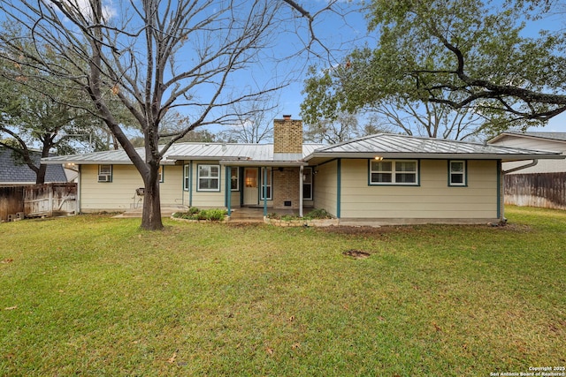 single story home featuring a front yard