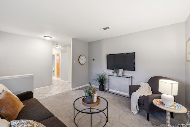 living room featuring light carpet