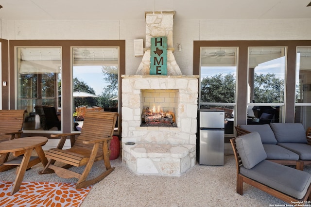 interior space featuring an outdoor stone fireplace