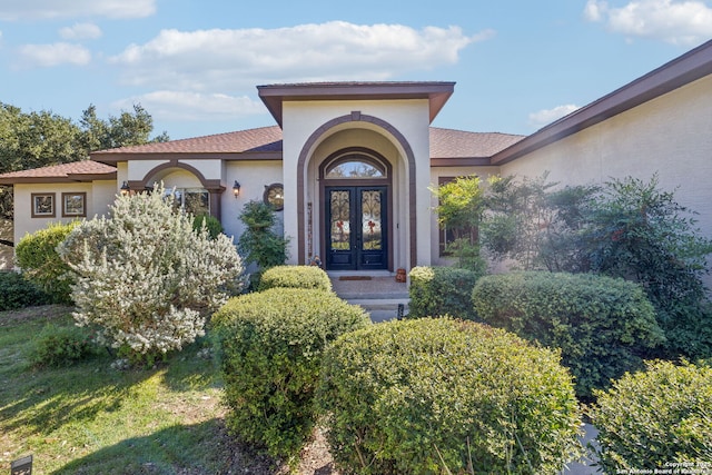 view of exterior entry with french doors