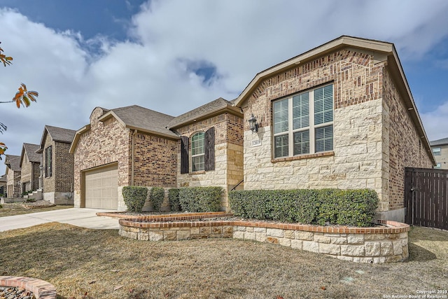 view of front of house with a garage and a front yard