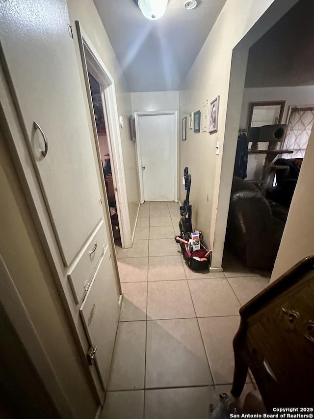 hallway with light tile patterned floors