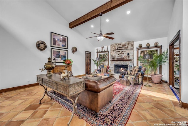 living room with ceiling fan, a fireplace, high vaulted ceiling, and beamed ceiling