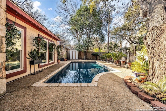 view of pool featuring a storage unit