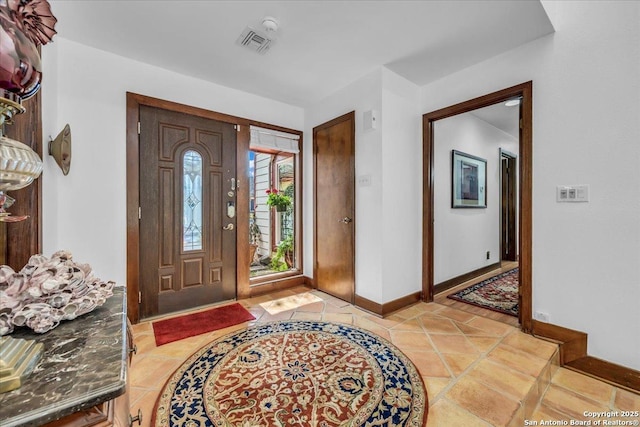 view of tiled foyer entrance