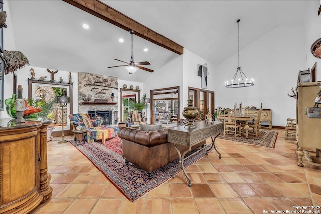 living room with beam ceiling, a fireplace, high vaulted ceiling, and ceiling fan with notable chandelier