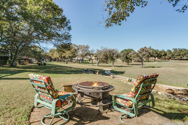 view of patio featuring an outdoor fire pit