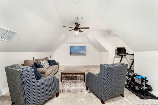 interior space with lofted ceiling, ceiling fan, and carpet