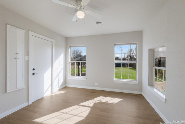 interior space featuring ceiling fan and light hardwood / wood-style floors
