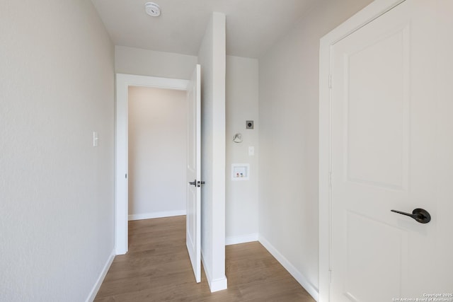 hall with light wood-type flooring