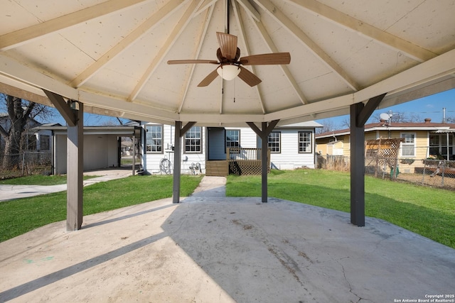 view of patio / terrace featuring a gazebo and ceiling fan