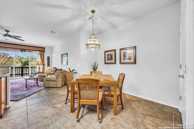 dining room featuring tile patterned flooring and ceiling fan