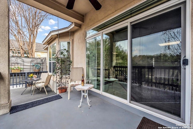 view of patio with ceiling fan