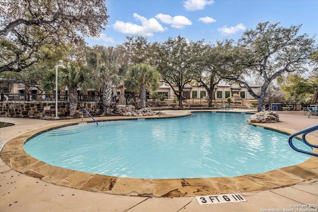 view of pool with a patio