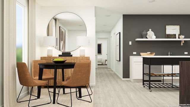 dining room with light wood-type flooring