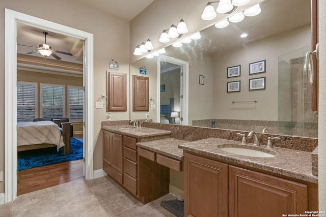 bathroom featuring ceiling fan, vanity, tile patterned flooring, and a shower