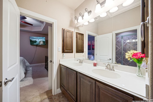 bathroom featuring vanity and ceiling fan