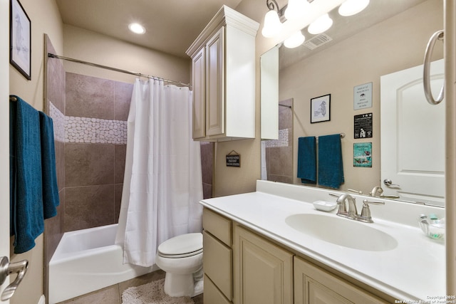 full bathroom featuring shower / bathtub combination with curtain, vanity, and toilet