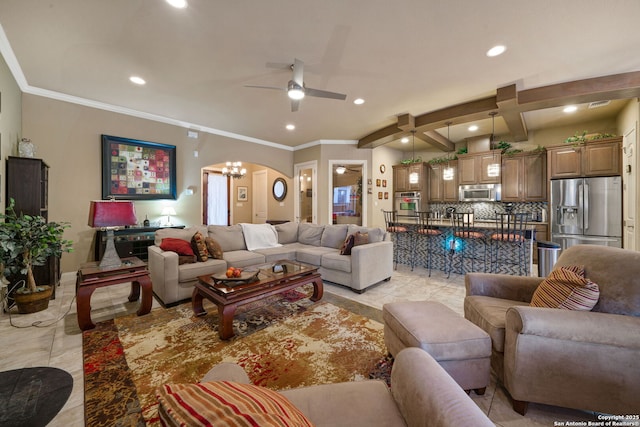 tiled living room with ornamental molding and ceiling fan