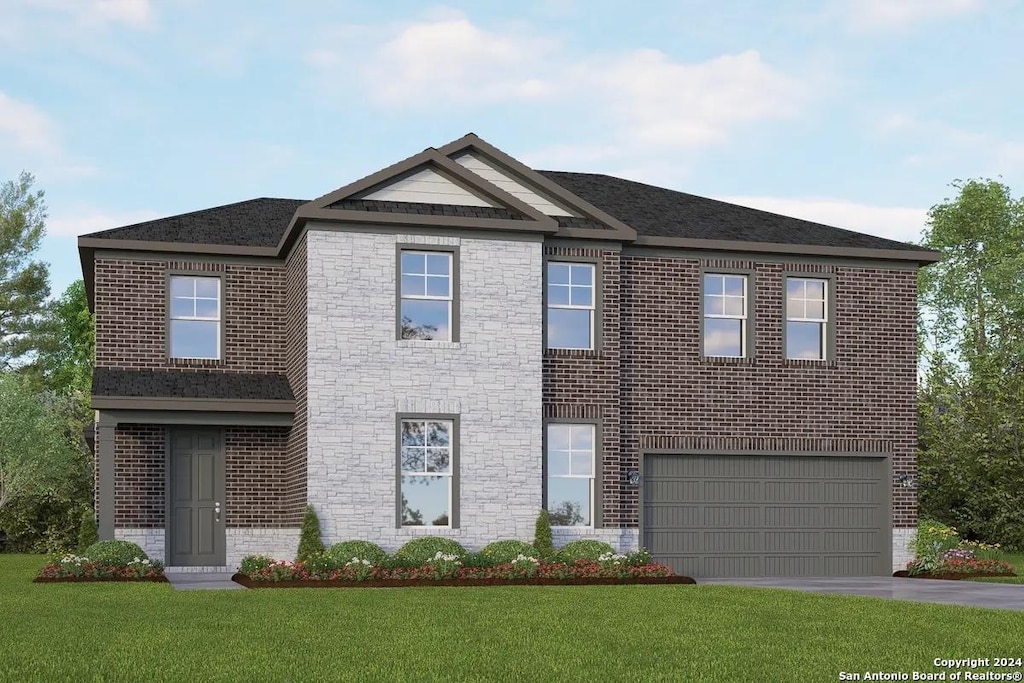 view of front facade featuring a garage and a front yard