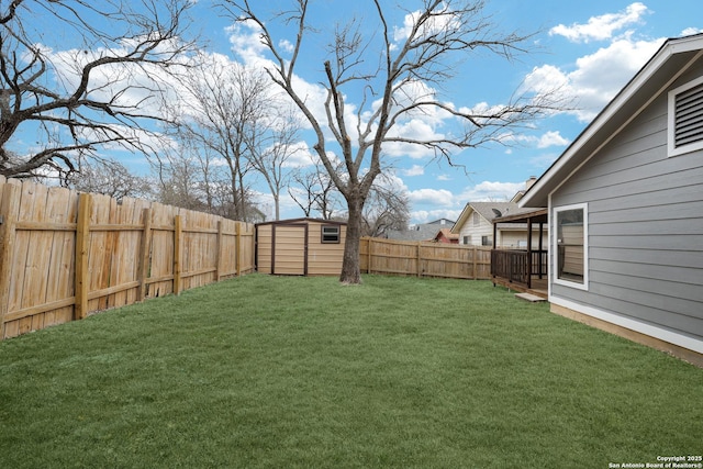 view of yard with a storage unit