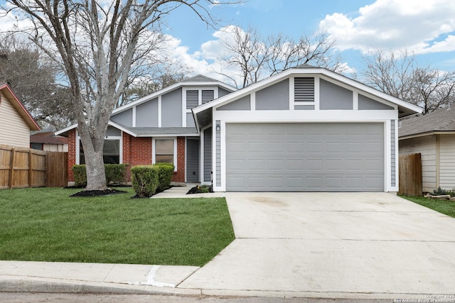 view of front of house featuring a garage and a front yard