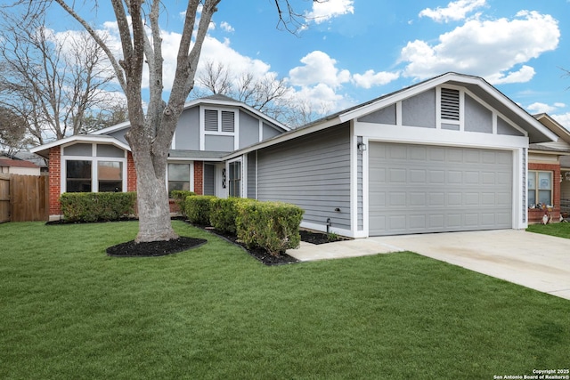 view of front of home featuring a garage and a front yard