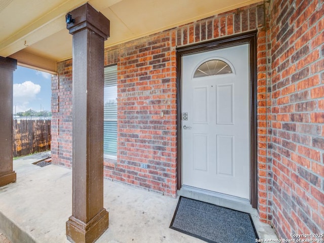 doorway to property featuring a porch