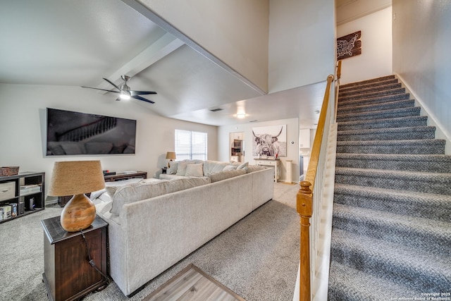 living room with lofted ceiling with beams and ceiling fan