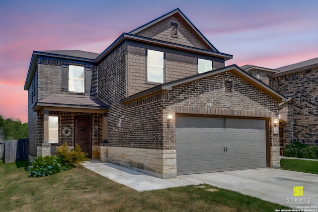 view of front of property with a garage