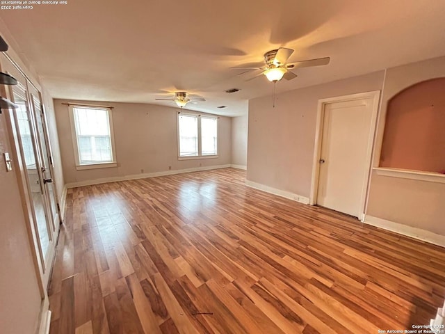 unfurnished room featuring ceiling fan and light hardwood / wood-style flooring