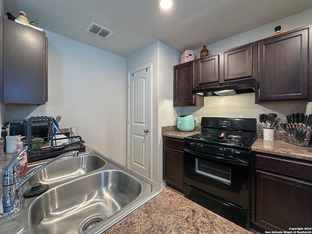 kitchen with dark brown cabinets, sink, and black range with gas stovetop